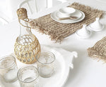 update alt-text with template De Fringe Raffia Placemat Rechthoeking - Naturel-Bazar Bizar-Default-de-fringe-raffia-placemat-rechthoekig-naturel-2-Deze prachtige handgeweven Raffia Placemat met franjes zal er prachtig uitzien als onderdeel van uw natuurlijke tafelschikking en geeft een prachtige boho touch. Geschikt voor de meeste binnen- en buitenstijlen. Kleur Naturel Breedte (cm) 35 Lengte (cm) 65 Materialen Raffia-7438246093006-BAJN013N-Cerasus Homestyle